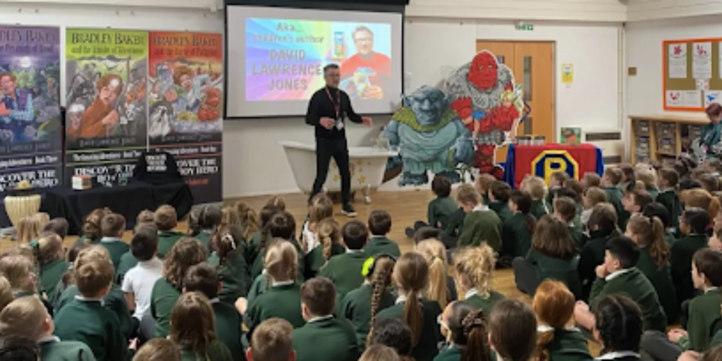 Children’s author David Lawrence Jones speaking to primary school pupils during a school reading event